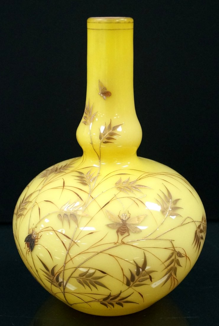 ART GLASS OPALINE LEMON YELLOW/PINK CASE GLASS BOTTLE: ART GLASS OPALINE LEMON YELLOW/PINK CASE GLASS BOTTLE NECK VASE WITH GILT LEAF AND ENAMEL BUG DECORATION. HEIGHT 7 1/2"
