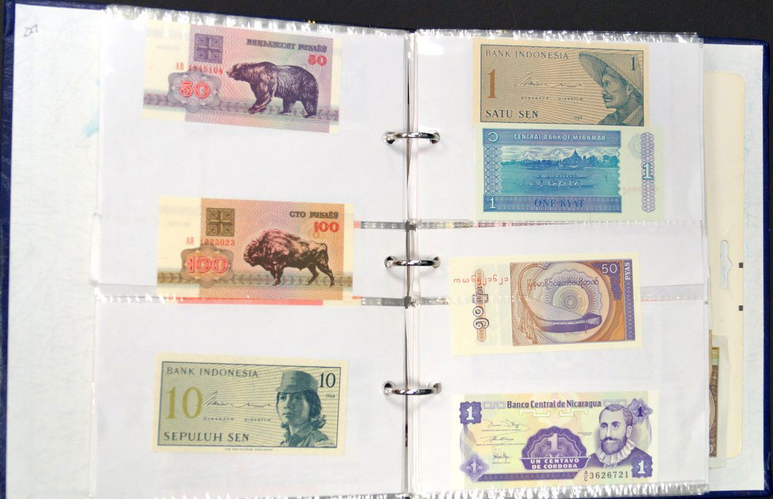 LOT (2) ALBUMS APPROXIMATELY (257) ASSORTED FOREIGN (1 of 2)