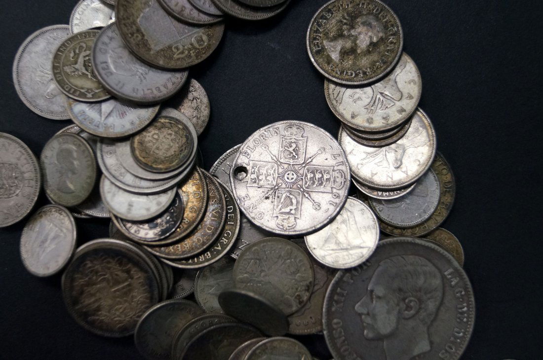 LOT ASSORTED FOREIGN SILVER COINS. APPROXIMATELY 35 OZT (1 of 1)