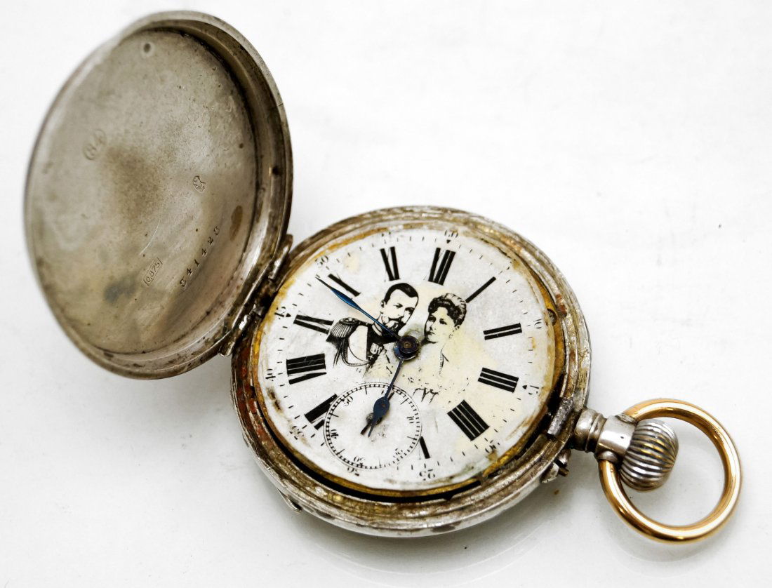 JULES CALAME 84 SILVER, 15-JEWEL HUNTER CASE POCKET: JULES CALAME 84 SILVER, 15-JEWEL HUNTER CASE POCKET WATCH WITH DIAL PICTURING NICHOLAS AND ALEXANDRA. DIAMETER 1 7/8" (IMPERFECTIONS/NO CRYSTAL)