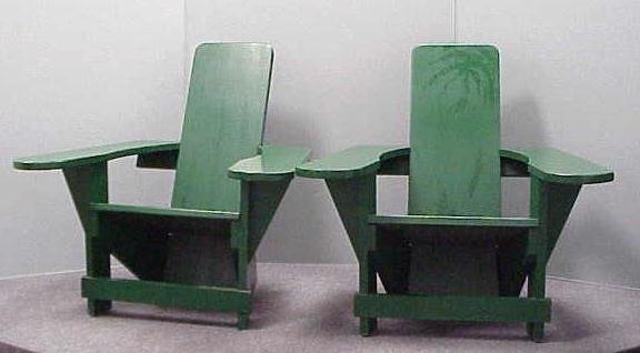PR ADIRONDACK STYLE PTD PADDLE ARM CHAIRS: PAIR ADIRONDACK STYLE PAINTED PADDLE ARM LOUNGE CHAIRS, 20TH CENTURY **DUE TO THE SIZE AND/OR FRAGILITY OF THIS LOT, STANDARD IN HOUSE SHIPPING IS NOT AVAILABLE. THE BUYER IS RESPONSIBLE FOR MAKING PI