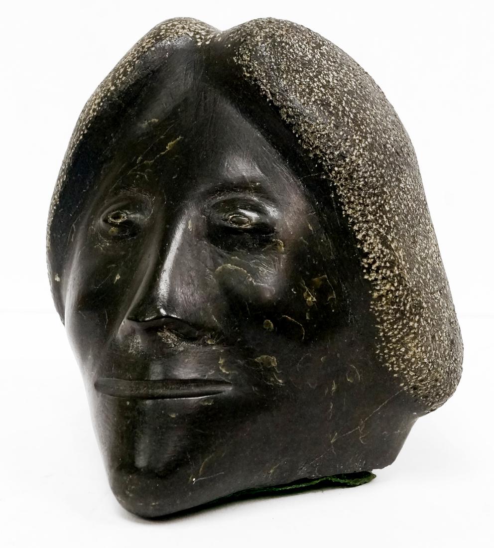 NORTH WEST COAST AND NATIVE AMERICAN CARVED GREEN STONE: NORTH WEST COAST AND NATIVE AMERICAN CARVED GREEN STONE HEAD, LABELED KARPIK. HEIGHT 6 1/2"