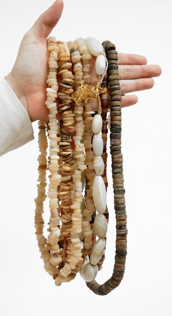 LOT (8) STRANDS AFRICAN CARVED STONE TRADE BEADS. (1 of 1)