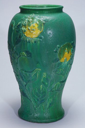 Monumental Owens carved vase, sunflowers, 21 1/4: Monumental Arts & Crafts vase with hand carved sunflowers quite possibly the work of Owens Pottery and most assuredly a vase made for some special occasion or exposition. Although unmarked, more than