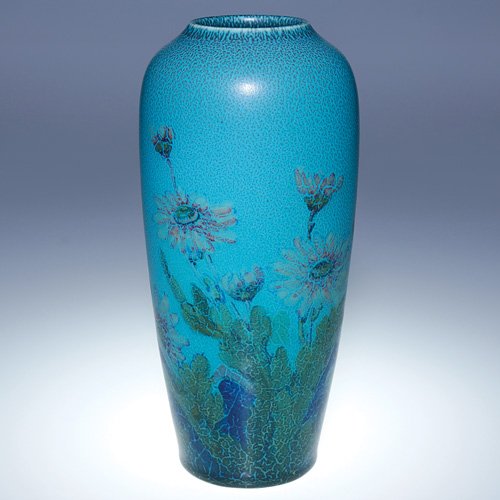 Rookwood Mat, floral, Pullman, 1929, 10": Decorated Mat 10 inch vase surrounded by colorful daisies, done by John Wesley Pullman in 1929. Impressed with the Rookwood symbol, the date and shape 2033 D and monogrammed by the artist in blue slip