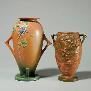 2 Rv: Columbine vase, 25-12", firing fault; Bushberr: Two Roseville vases with raised marks: Columbine in brown, shape 25-12". Height 12 1/4 inches. Firing fault in base. Good mold and glaze. Bushberry in russet, shape 35-9". Height 9 1/2 inches. Chip