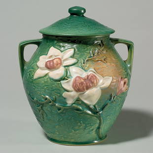 Roseville Magnolia cookie jar, shape 2-8, green: Nice Magnolia cookie jar with cover, shape 2-8" in green with raised marks. Height 10 5/8 inches. Crisp mold, good color.