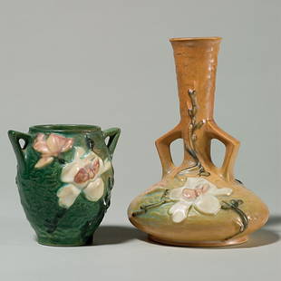 2 Rv Magnolia: vase, brown, 179-7"; green vase 86-4: Two Magnolia with raised marks: Stick vase, shape 179-7" in brown. Height 7 1/4 inches. Good color, soft mold. Vase, shape 86-4" in green. Height 4 1/8 inches. Good mold and color.