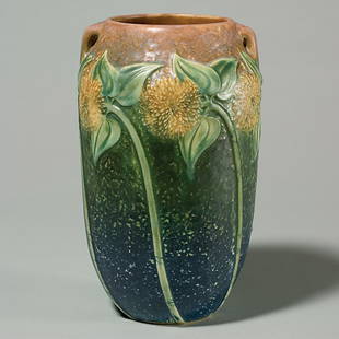 Roseville Sunflower 10 1/4"vase, tight line at base: Roseville Sunflower 10 1/4 inch vase with two small handles. Shape 492-10". Unmarked. There is a tight line across a portion of the bottom and going up the side a bit.