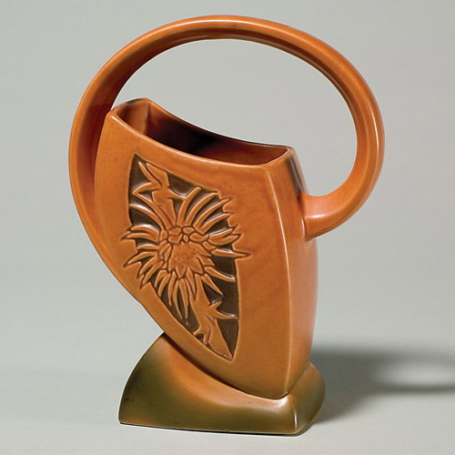 Roseville orange Silhouette basket, shape 710-10.