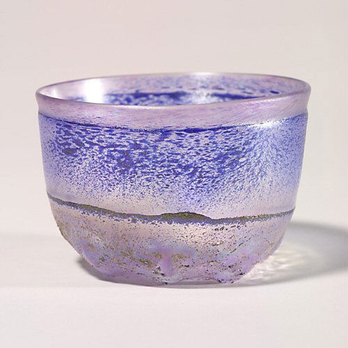 Kosta Boda glass bowl, blue, 3" x 5": Unique Swedish vase in iridescent verre-de-soie with cobalt sprays above a textured base. Engraved "Boda 4909" with artist's signature "B (Bertil) Vallien". Height 3 inches.