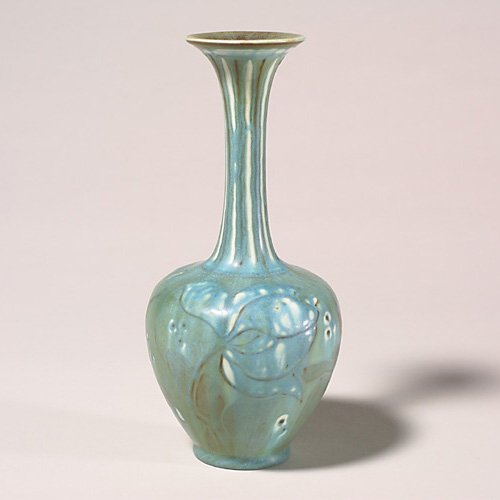 Rookwood mat vase, Barrett, slip floral: Slender necked Decorated Mat glaze vase with slip trailed floral design done by Elizabeth Barrett in 1944. Marks include the Rookwood logo, date, shape number 778 and the incised initials of the artis