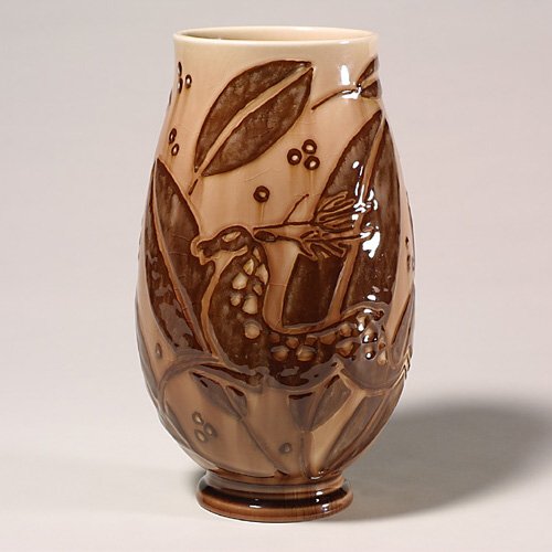 Rookwood HG vase, deer and flowers, Bar: Design Crystal lamp vase with Art Deco deer and foliage done in very heavy slip by Elizabeth Barrett in 1948. Marks include the company logo, the date, shape number 6982, the notation "45-" in grease