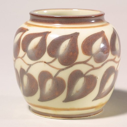 Rookwood high glaze vase, leaves, Barre: Pretty Decorated Porcelain with a band of leaves encircling the body, the work of Elizabeth Barrett in 1945. Marks include the Rookwood logo, the date, shape number 6319 D, the incised notation 3091 a