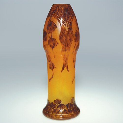 LeVerre Francais vase, candy cane, 10 3/4": Cylindrical LeVerre Francais vase with a recurring design of seed pods framed by their foliage dangleing above a pebbled base. The pleasing tortoise shell design lies against a nice amber backdrop. Th