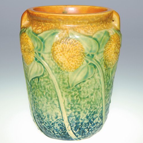 Roseville Sunflower vase, 2 handles, 5 7/8"k: Roseville Sunflower vase with two small handles. Unmarked. Height 5 7/8 inches. Good mold, glaze and color.