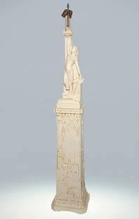 Northwestern Terra Cotta Co. Art Deco newell post: Amazing Art Deco style two piece newell post crowned with a lamp made by the Northwestern Terra Cotta Company of Chicago, Illinois. The 64 inch tall sculpture is comprised of many Art Deco elements: g