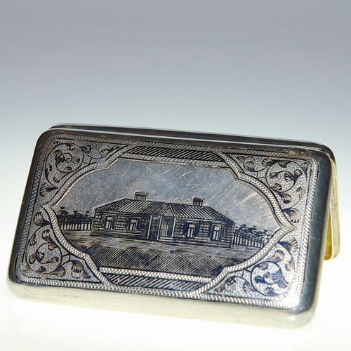 Russian silver cigarette case, niello bldg,4X2 1/2: Silver and niello Russian cigarette case. An Arts & Crafts dwelling graces the front surrounded by scrolling vines against a stippled backdrop. The back repeats the front design and is engraved "P. St