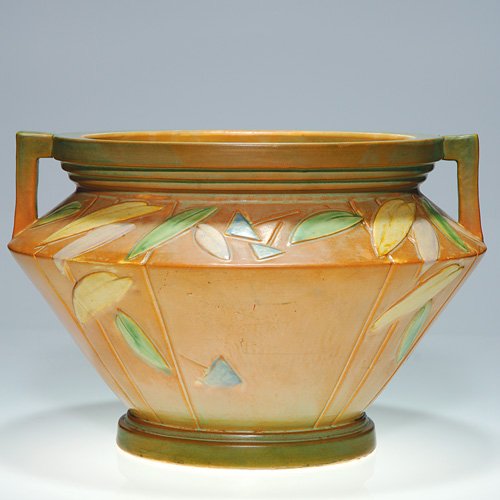 Large Roseville Futura jard, 616-10: Roseville Futura 9 3/4 inch by 14 1/2 inch jardiniere, shape 616-10". Marked on base with shape number in orange crayon. There is overall crazing.