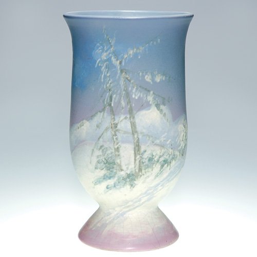 Weller Hudson Pictorial, 10 1/2" snow scene, McLau: Weller Hudson Scenic vase decorated by Sara Reid McLaughlin who arrayed a snow covered scene featuring hills, trees and a road. Marked with the Weller incised mark and signed by the artist in slip on 