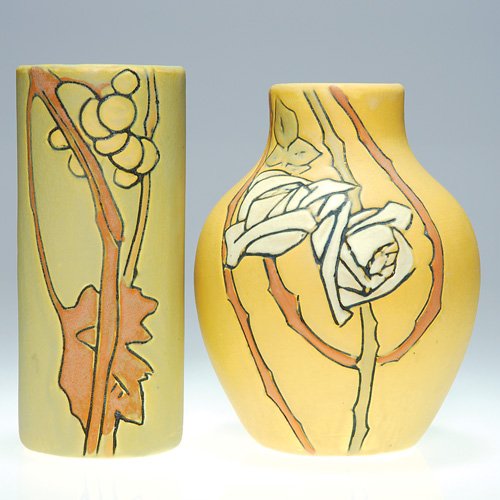 Weller Etched Matt 2 pieces, roses, grapes: Weller Etched Matt lot of two vases: The first is 6 1/4 inches with white Scottish roses; lightly impressed Weller in block letters; fine overall crazing and having a minor glaze inclusion. The second