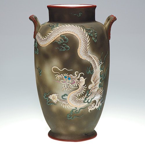 Nippon Moriage Dragon vase, two handled, 10: Impressive Nippon Moriage 'Dragon" vase done in several colors of thick slip with great detail. Marked with the 'M" in wreath Nippon logo (Van Patten # 47). Height 10 inches. Minor rubs to the mat sur