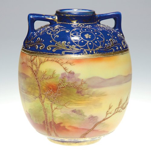 Nippon scenic 'Galle" vase, handles, 4 7/8" : Nippon vase with a 'Galle" scenic view. An eventide setting having enameled barren trees in the foreground that overlook a quiet lake surrounded by distant mountains with islands in between. The cobal