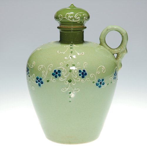 Rare Moorcroft Gesso Faience jug, ca 1898, 7: Seldom seen Moorcroft-Macintyre Gesso Faience whiskey jug with stopper, circa 1898. The green vessel was decorated with a lacy slip-trailed design surrounding cobalt blue blossoms on the shoulder. Mar
