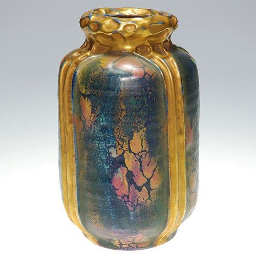 Rare Amphora confetti vase, 6 7/8: Rare Amphora 'Confetti" vase done in mottled mat glazes with lots of gold trim and ribbing. Impressed 'Amphora 3737" on the bottom. Height 6 7/8 inches. There is a tiny glaze nick to one of the vertic