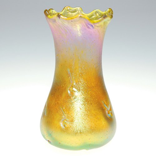 Loetz 'Candia Silberiris Astartig" vase, 3 1/2": Miniature Loetz 'Candia Silberiris Astartig" vase with rainbow iridescence. The corset body having tooled designs with an irregular pulled rim. Height 3 1/2 inches. Attractive and in excellent conditi