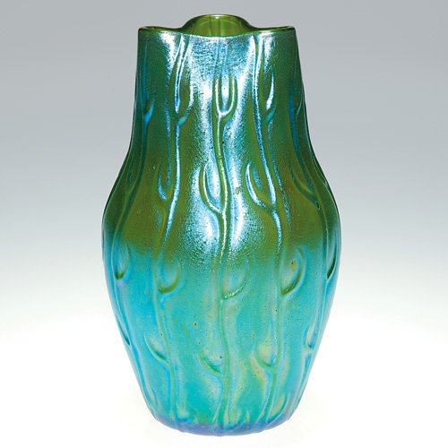 Loetz 'Neptun" vase, blue, 6 3/4" : Loetz vase with the 'Neptun" pattern covering the iridescent blue surface and having a tri-con rim. Height 6 3/4 inches. Beautiful and in excellent condition.