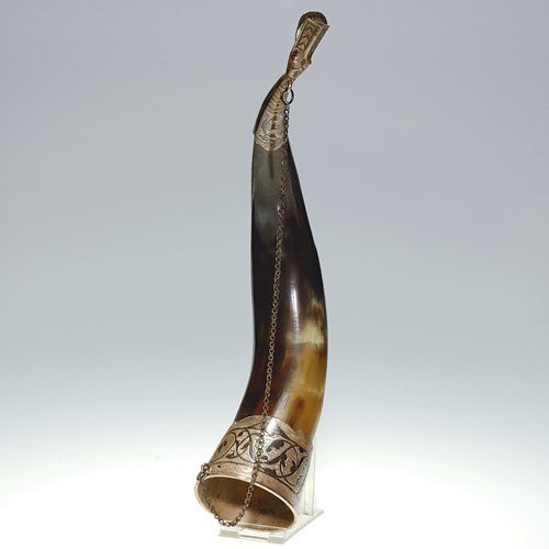 Russian powder horn with Niello silver mounts, 11: Russian powder horn with Niello and engraved silver mounts, the metal tip formed as a goose head. Length is 11 inches. The silver impressed '875" with hammer and sickle within a star, the initial 'AM8