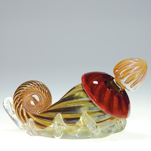 Chuck Sorrels Nautilus perfume,stopper,6 1/2: Chuck Sorrels 'Nautilus" perfume with a lilac ruby collar resting upon a clear 'wave" base. Height 2 1/4 inches, length 6 1/2 inches with reed stopper. Very good condition. Artist signed.