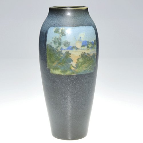 Rookwood Vellum scene, Conant, houses, 8 7/8": Scenic Vellum 8 7/8 inch vase decorated by Arthur Conant in 1916. Mr. Conant created two panels on the vase upon which he depicted Dutch farm landscapes, including trees, fields, houses and a windmill