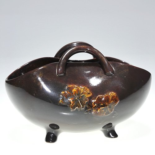Rookwood Mahogany Glaze basket, AMB, 1886: Mahogany (Standard) Glaze 4 1/4 inch by 6 1/2 inch basket with twin handles, decorated with simple flowers by Anna Bookprinter in 1886. Impressed Rookwood in block letters, the date, shape 45 D and an
