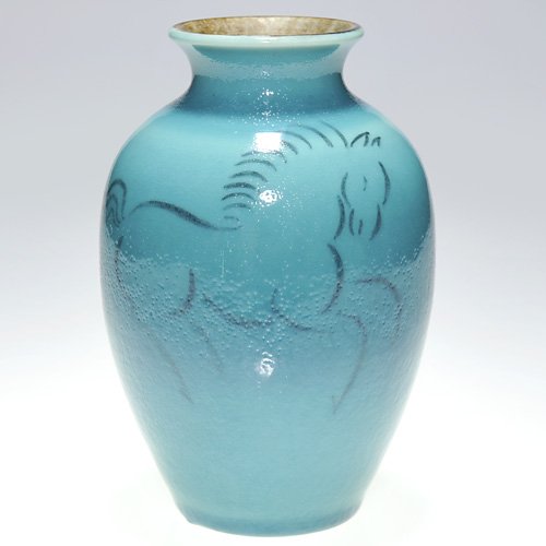 Rookwood 6 1/2" porcelain, horses, Rehm, 1955: Unusual 6 1/2 inch porcelain vase, decorated in 1955 by Wilhelmine Rehm who "sketched" a prancing, stylized horse in black slip against the blue ground. Impressed with the Rookwood logo, the date, an 
