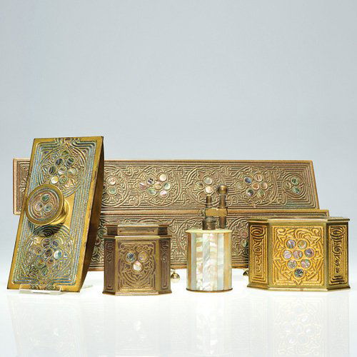 Tiffany desk set, Abalone gilt bronze, 6 piece: Tiffany Studios Abalone gilt bronze desk set comprising a 5 3/4 inch rocker ink blotter; a 2 1/2 inch covered ink well with glass insert; a pair of 12 1/4 inch blotter ends; 3 3/4 inch lighter and a 2