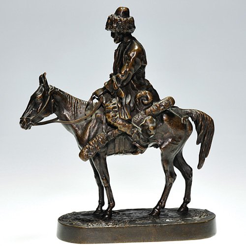 Lanceray Russian bronze, cossack on horse, 8 3/4": Russian bronze sculpture by Yevgeny A. Lanceray of a traveling cossack wearing a pelted cap and long winter coat ridding on horseback. Height 8 3/4 inches. The base is marked "Lanceray" in cyrillic an