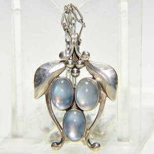 Georg Jensen moonstone & silver necklace, 1": Georg Jensen silver necklace with a trio of oval moonstones, measuring 1 inch by 7/8 inches. Impressed "GI 830S" "Copenhagen" within dotted ovals. Silver 17 inch silver link chain.