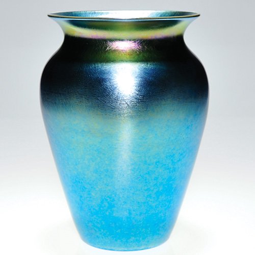 V Durand vase, iridescent blue, 8 1/2", signed: Large Victor Durand vase in iridescent blue that has a halo of magenta and gold about the neck. Height 8 1/2 inches. Signed "V Durand" and numbered 20145-9 in the pontil. There is a factory bump on th