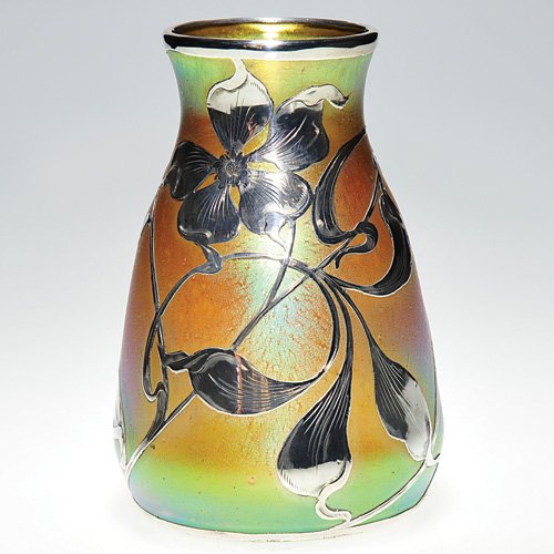 Loetz green vase, silver overlay, 6 5/8": Good Loetz "Candia Silberiris" vase beautified with Art Nouveau silver overlay. The silver forms a solitary blossom attached to a creeping vine with buds and foliage. Height 6 5/8 inches. Very handsom