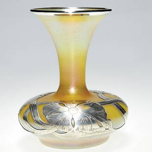 Loetz "Silberis" vase, Alvin silver overlay, 6": Loetz "Silberiris" vase upon which Alvin Manufacturing Company applied a trio of silver poppies with leaf blades around the bulb and a silver ring about the rim. Height 6 inches. The silver is impress