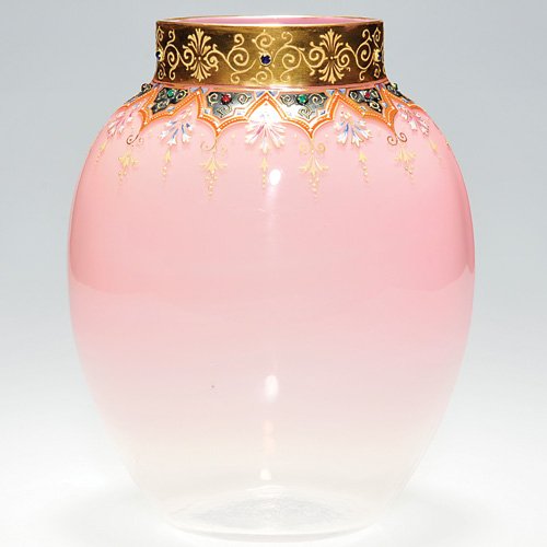Moser attrib enamel, beaded vase, pink,8 3/4": Pretty Moser attributed vase in pale pink with a Persian style pattern encircling the shoulder and bright gold about the collar. Colorful glass beads adorns the attractive pattern. Height 8 3/4 inches