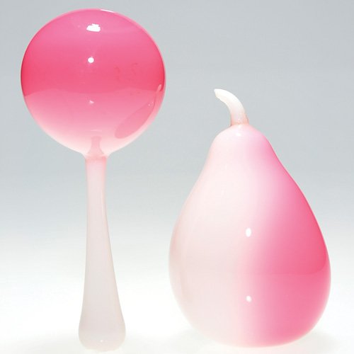2 World's Fair Peachblow: pear & darner: Two Peachblow items created at the fairgrounds of the 1893 Chicago World's Fair. A shapely pear standing 4 1/2 inches and a sock darner measuring 6 inches in length. Both are in excellent condition.
