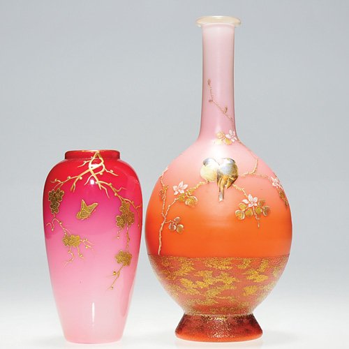 2 Webb decorated vases:Peachblow & orange: Two Thomas Webb vases: 1)Glossy Peachblow vase having a butterfly within a floral branch applied with raised gold. Height 5 inches. Excellent condition. 2) Shaded orange satin vase enameled with a pai