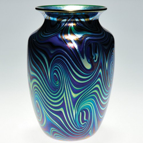 Early Orient & Flume "King Tut" vase, 6 1/2": Early Orient & Flume vase displaying a rhythmic King Tut pattern in silvery blue and cobalt. Height 6 1/2 inches. Engraved "Orient & Flume" with 1977 date and design number D12 beneath. Beautiful and 