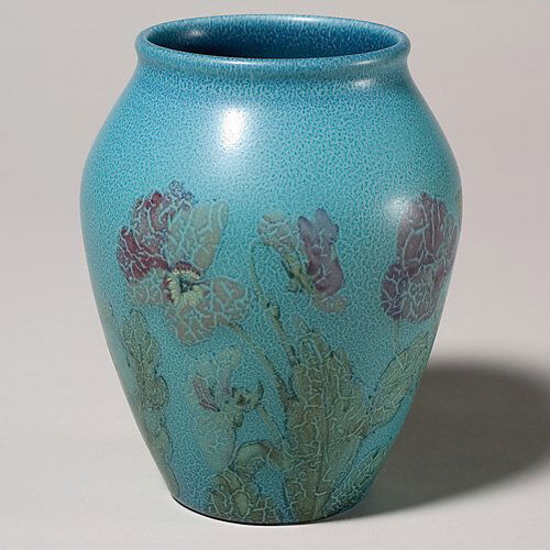 Rookwood mat floral, Pullman 1929, 915 D, 7": Mat glaze 7 inch vessel with an array of pansies encircling the vase, painted by John Wesley Pullman in 1929. The profusion of flora is nicely accented by the stipple technique employed by the decorat