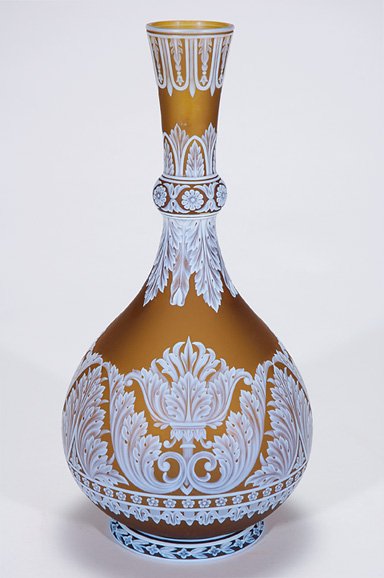 English cameo vase,marked Webb, leaves, 12 3/4",: Notable English cameo vase, the masterful work of Thomas Webb & Sons. The golden raisin body has been painstakingly carved with an abundance of acanthus foliage, a design perhaps inspired from the Cor