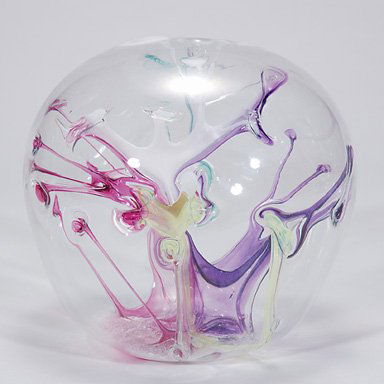 Bramhall, Peter sculpture, 8 1/2": Unique crystal sculpture, the creative efforts of Peter Bramhall in 1986. Encased is an eruption of glass propelled to the outer limits of the sphere in shades of ruby, teal, purple and white. Height