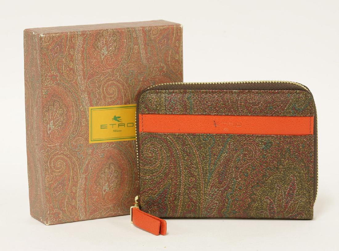 A Tory Burch black 'Robinson' satchel: A Tory Burch black 'Robinson' satchel,designed in black saffiano leather with gold-tone hardware, lined with blue fabric, with strap,together with an Etro multicoloured paisley leather wallet, orange